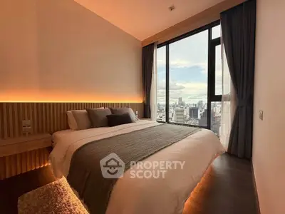 Luxurious bedroom with stunning city view and modern decor