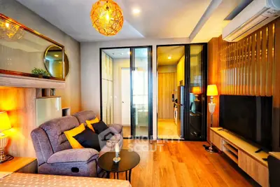 Modern living room with stylish decor and open kitchen layout