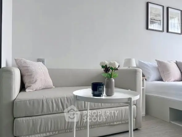 Modern living room with cozy sofa and stylish decor