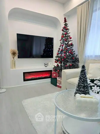Stylish living room with modern decor and festive Christmas tree