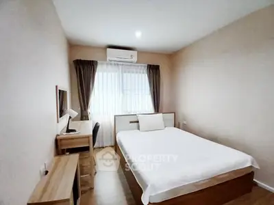 Cozy bedroom with modern furniture and natural light