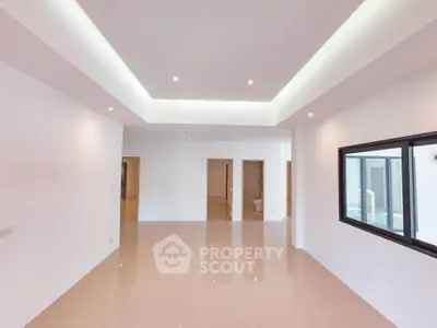 Spacious modern interior with sleek lighting and glossy flooring