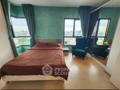 Spacious bedroom with city view and modern decor in high-rise apartment
