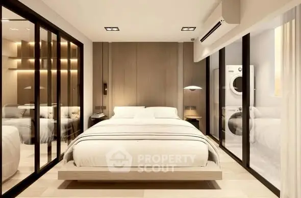 Luxurious modern bedroom with glass walls and in-unit laundry, featuring sleek design and ambient lighting.