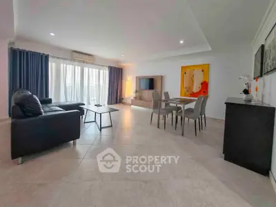Spacious modern living room with elegant decor and ample natural light