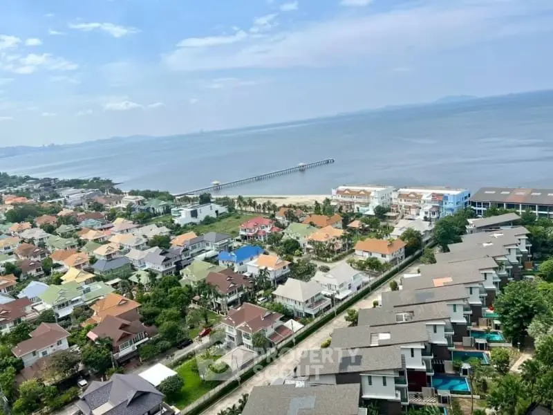 Stunning aerial view of coastal residential area with ocean backdrop