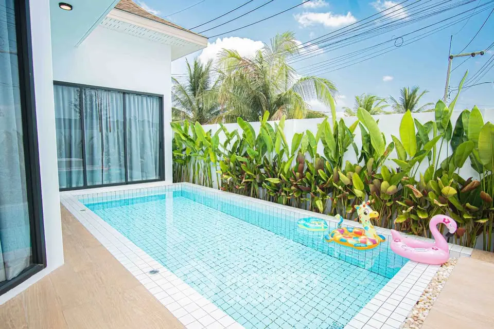 Charming villa with private pool and lush greenery, perfect for relaxation and leisure.