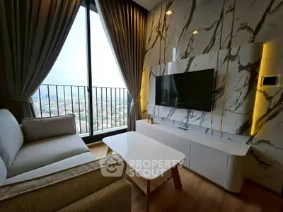 Luxurious living room with stunning city view and modern marble wall design.