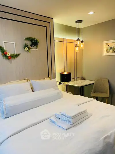 Cozy and stylish bedroom with modern decor and ambient lighting, perfect for relaxation and comfort.