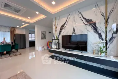 Luxurious modern living room with marble accent wall and sleek TV setup