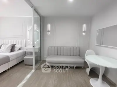 Modern minimalist bedroom with sleek furniture and neutral tones