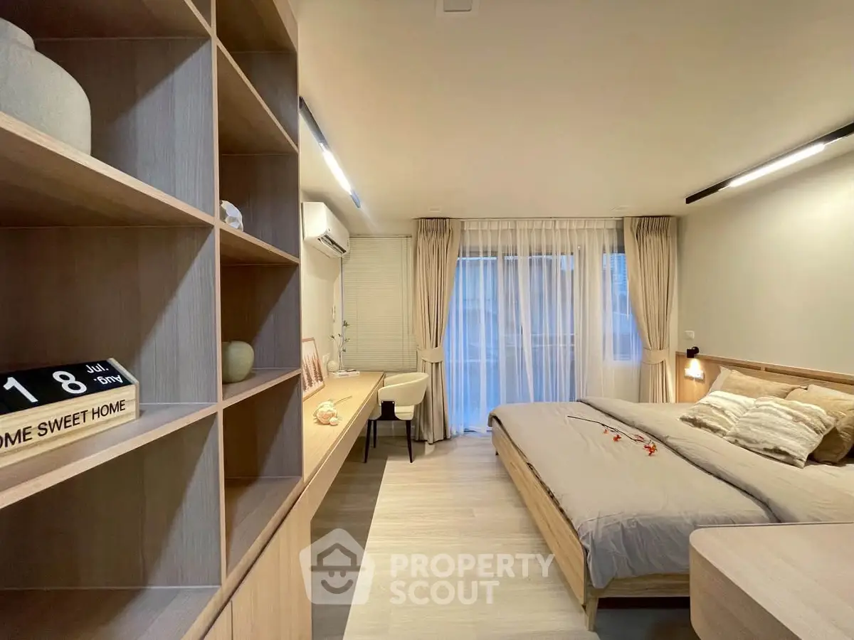 Modern bedroom with stylish wooden furniture and cozy decor, perfect for a serene living experience.