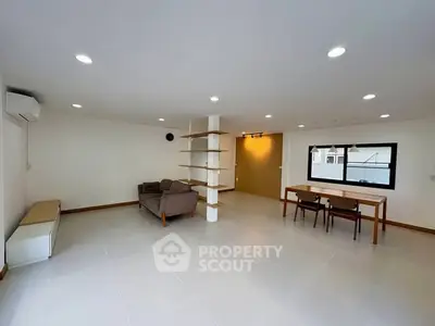 Spacious modern living room with open layout and stylish furniture