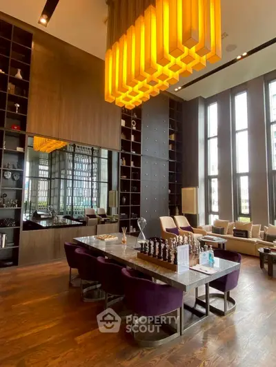 Luxurious modern living room with high ceilings and elegant lighting