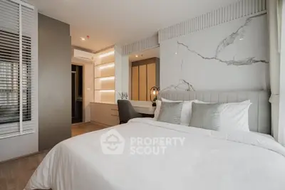 Modern bedroom with elegant decor and cozy ambiance