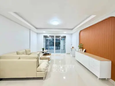 Spacious modern living room with sleek furniture and stylish decor