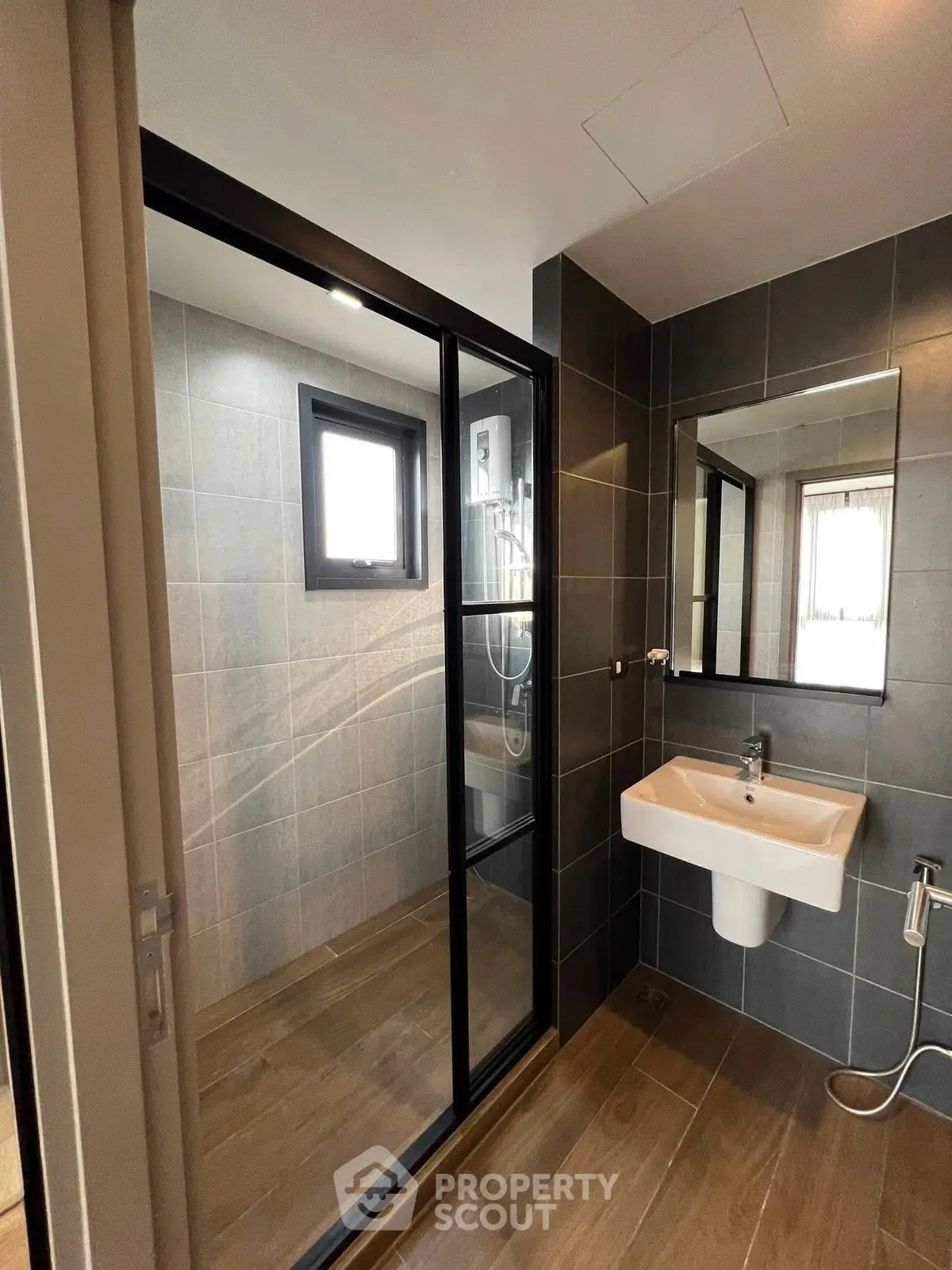 Modern bathroom with sleek design and glass shower enclosure