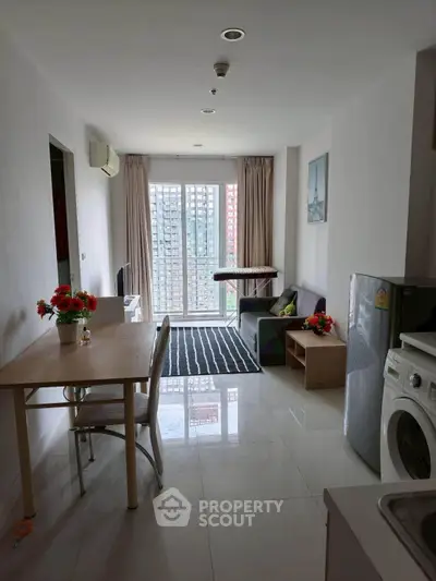 Modern apartment living room with balcony view and stylish decor