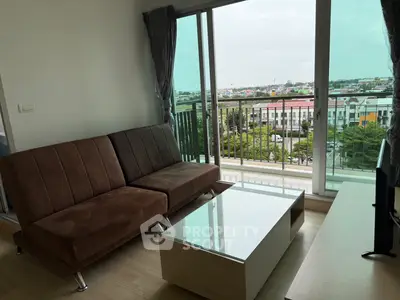 Modern living room with brown sofa and city view balcony
