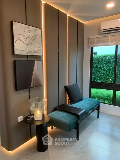 Modern living room corner with stylish bench and ambient lighting