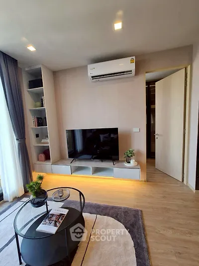 Modern living room with sleek TV setup and stylish decor