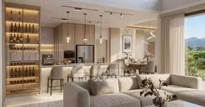 Luxurious open-plan living room and kitchen with elegant decor and stunning mountain view.