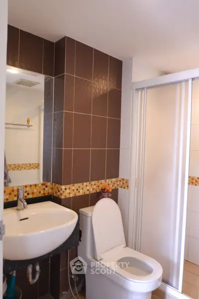 Modern bathroom with sleek design and shower enclosure