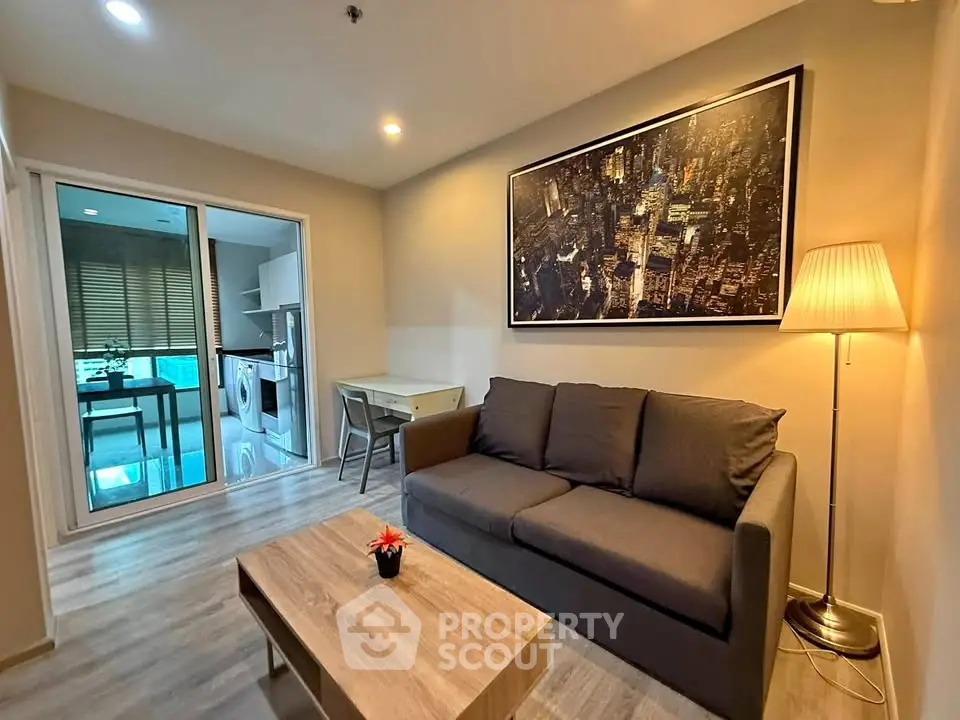 Modern living room with cozy sofa and stylish decor in a contemporary apartment.