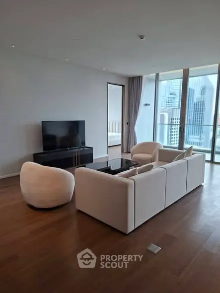 Luxurious modern living room with city view and elegant furniture