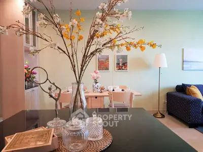 Charming living room with elegant decor and cozy dining area, perfect for modern living.