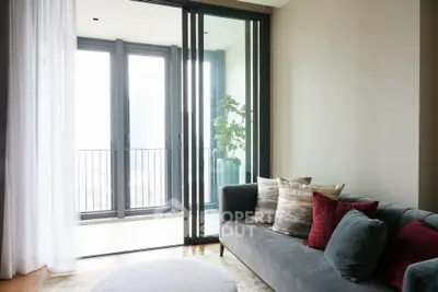 Modern living room with balcony access and stylish decor