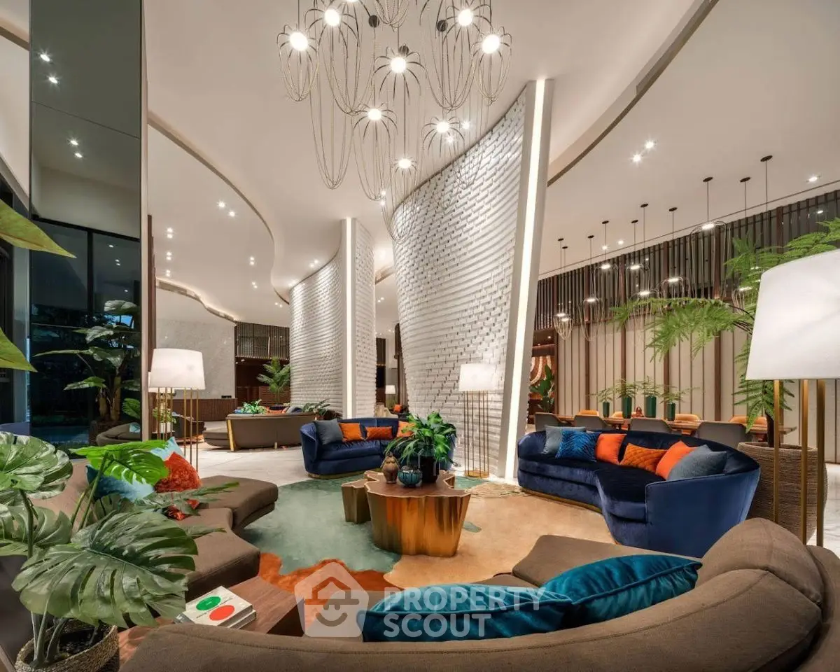 Luxurious modern living room with elegant decor and plush seating in a spacious open layout.