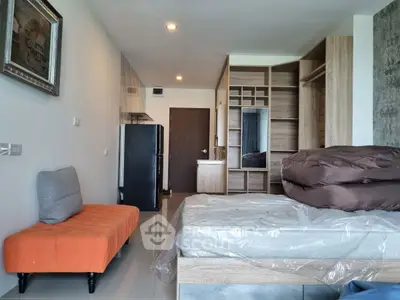 Modern studio apartment with stylish furniture and open layout