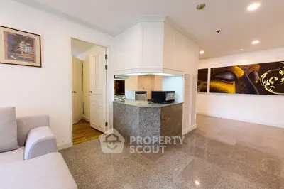 Spacious living area with modern design and artistic decor