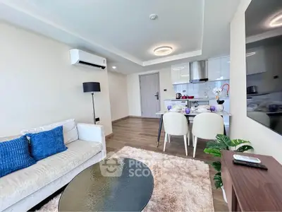 Modern living room with elegant dining area and stylish decor