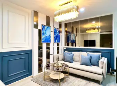 Luxurious living room with elegant decor and modern chandelier