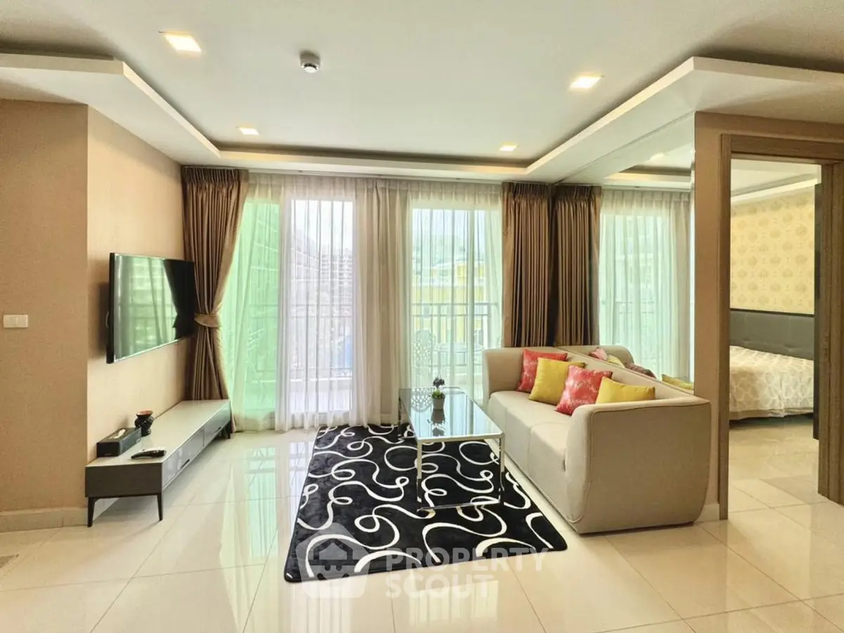 Spacious modern living room with elegant decor and natural light