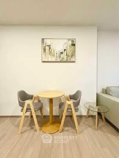 Modern minimalist living room with stylish furniture and elegant decor.