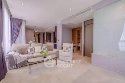 Spacious modern living room with elegant decor and natural light