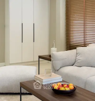 Modern living room with cozy sofa, stylish coffee table, and elegant decor