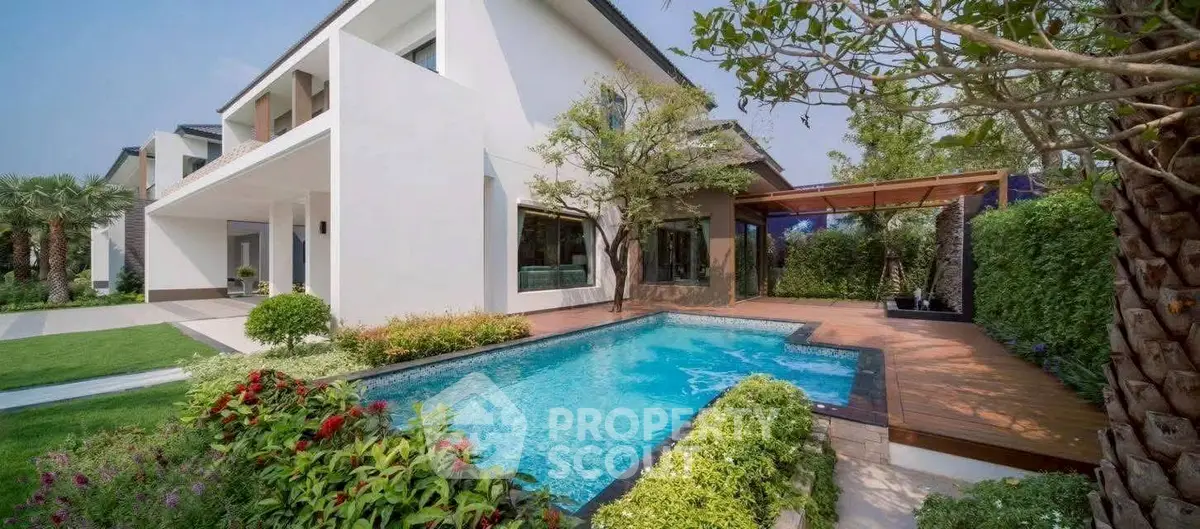 Luxurious modern villa with private pool and lush garden