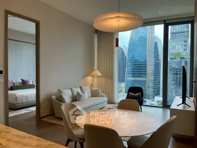 Modern living room with city view, stylish furniture, and elegant lighting.