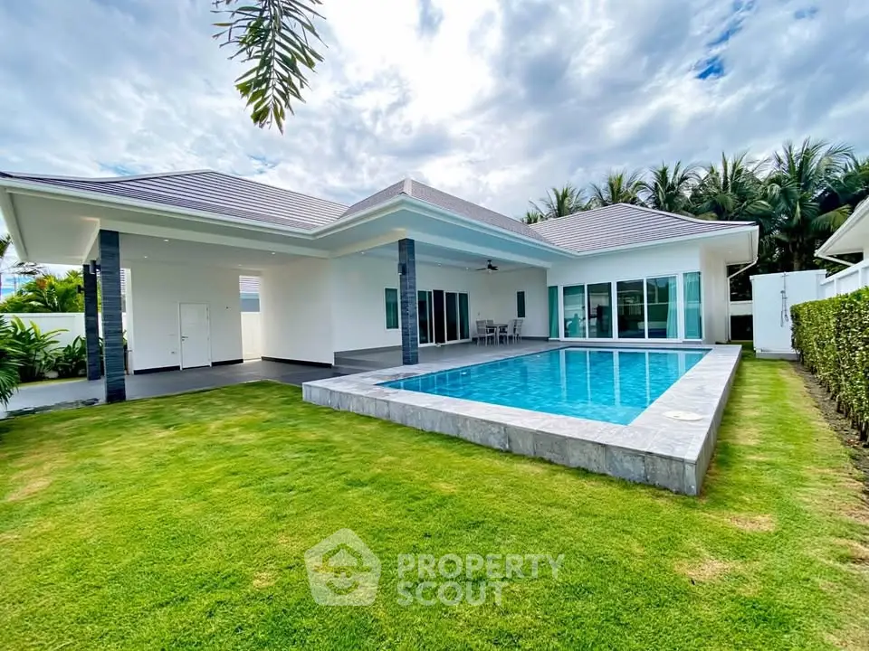 Luxurious modern villa with private pool and lush garden, perfect for serene living.