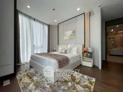 Luxurious modern bedroom with elegant decor and large windows