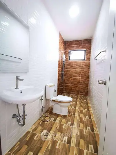 Modern bathroom with stylish tile design and sleek fixtures