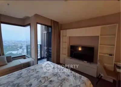Luxurious bedroom with stunning city view and modern furnishings