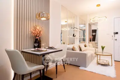 Modern living room with elegant decor and cozy seating area, perfect for relaxation and entertaining.