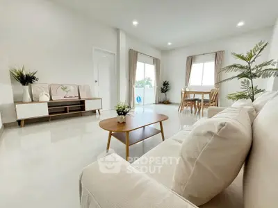 Spacious modern living room with elegant decor and natural light
