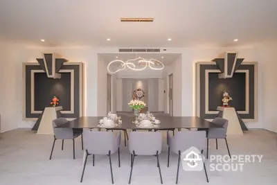 Elegant dining room with modern chandelier and stylish decor