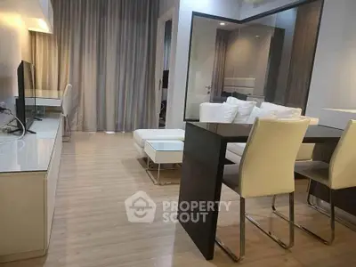 Modern living room with sleek furniture and open layout, perfect for contemporary living.